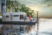 The Coon 1000 Houseboat