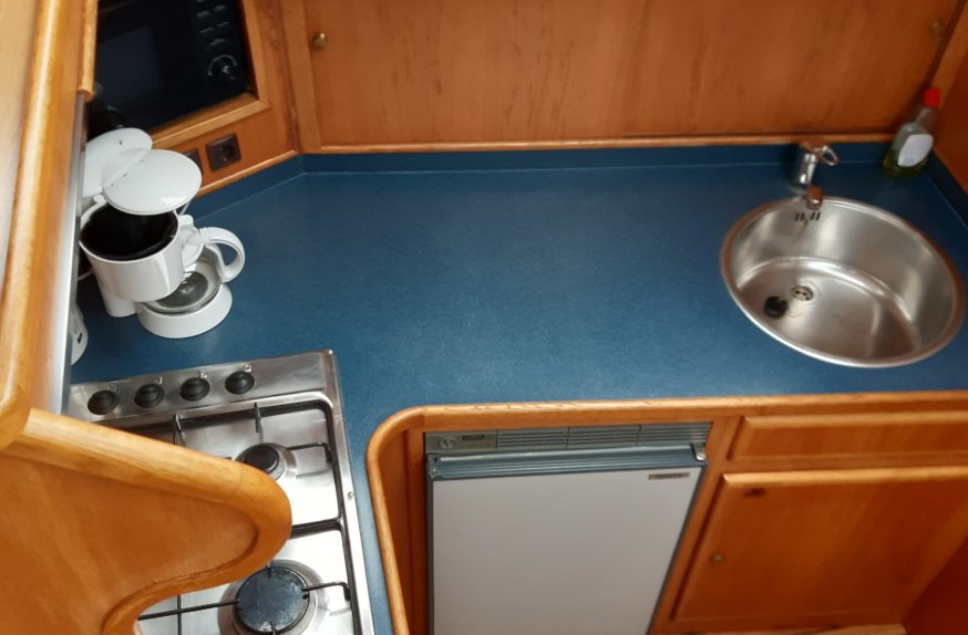 Ruime keuken Gasfornuis werkt op gas.