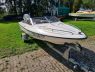 Fletcher Bravo inc. 115pk Evinrude en trailer